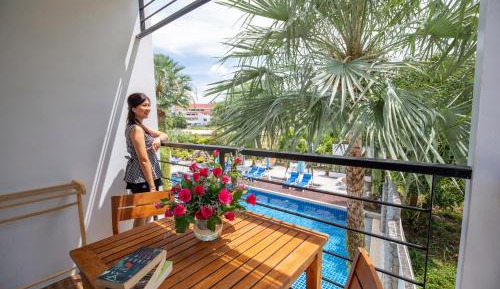 Grand Deluxe Balcony Room with Pool View