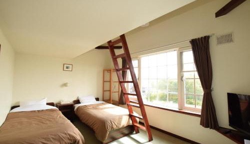 Quadruple Room with Shared Bathroom