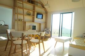 Curio Bay House | The Little Black Barn overlooking Curio Bay