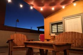 Ulbrich House | Yellow house with backyard for parties