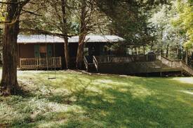 Lobelville Cabin | Sweeney Bluff Lodge steps away from the river