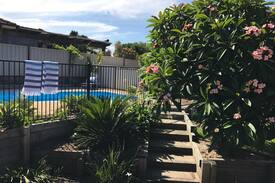 Anna Bay House | Cracker getaway with pool and entertaining space