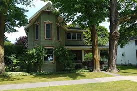 Charlevoix House | Dixon Ave. just steps from town. Walk to Lake MI!