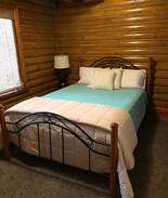Orange City Cabin | Unique "Log Cabin on a Lake" in the Woods