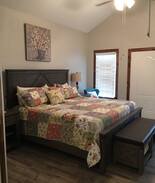 Pawhuska Hotel | Prairie Cottage King Suite 1/2 block from PW Merc
