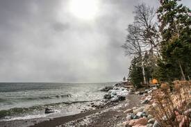 Tofte Cabin | Temperance Landing 24 is a luxury log home nestled on the edge of Lake Superior in the town of Schroeder, MN