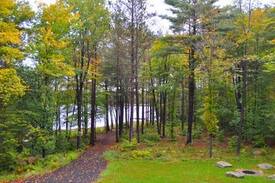 Smallwood House | Lakefront log home w/dock on Swinging Bridge Lake