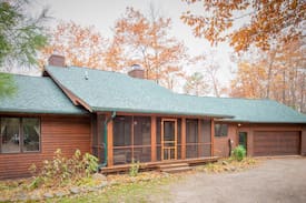 Comstock Cabin | Gorgeous Pipe Lake Retreat: Wooded, Spa, Sleeps 10