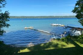 Kewadin Cabin | Torch Lake Sunrise Sandy beach on Torch Lake