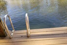 Wildwood Point House | Relax among the palms at Reeled Inn