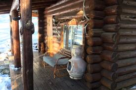 Missoula County House | Log cabin nestled in the mountainsides