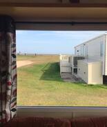Grimsby Other | Sandy Toes Caravan, Sea View- Dog Friendly