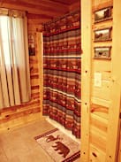 Hochatown Cabin | Black Bear Lodge is a two story cabin located in the heart of Hochatown close to all the amenities that Beavers Bend State Park and Broken Bow lake has to offer. It has an open floor plan and sleeps 7-10 people