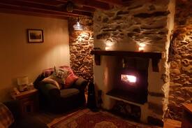 Newborough Cabin | Tan Y Fron Cottage Newborough beach with cosy fire