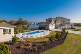 Sandbridge House | Summer Baycation: Summer Baycation Exquisite home on the bay with pool, hot tub, and dock