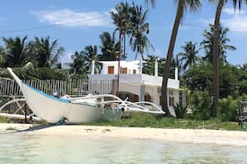 Santa Fe Villa | MaxMat Beach Front house in Bantayan Island