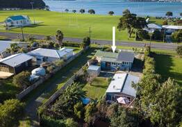 Whangateau House | Blue bach by the beach!
