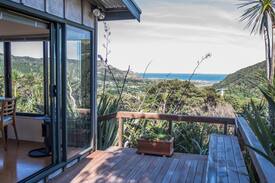 Auckland Region Cabin | West Coast private hilltop hideaway