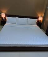 Baybay City Bed & Breakfast | Eddie's Place - King bed 1