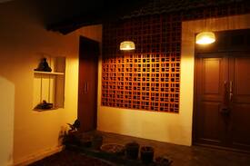 Palayam House | Idam- cosy double bedroom with a great breakfast