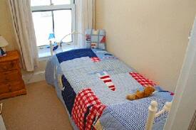 Penrhyn Bay Cabin | Fir Tree Cottage on the North Wales Coast.