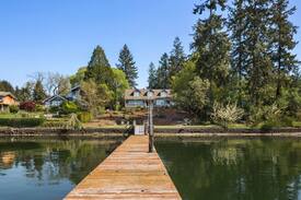 Fox Island House | Shell Cottage Luxury Waterfront Home with Dock - Abigail's Vacation Rentals