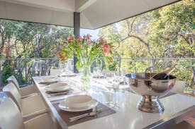 Eagle Bay House | Deck House - Stunning treetop and ocean glimpses