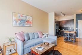 First Ward Apartment | Uptown condo with private skyline terrace views