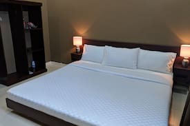 Baybay City Bed & Breakfast | Eddie's Place - King bed 1