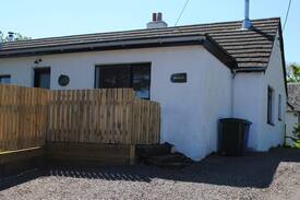 Balvicar Cabin | An Tigh Cottage Isle of Seil - wood burning stove