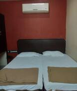Kurnool Hotel | iROOMZ Woodlands Lodge Deluxe A/c Room Kurnool