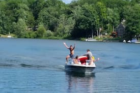 Irons House | COZY WATERFRONT BOATHOUSE BIG BASS LAKE IRONS MI