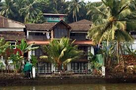 Ribandar Villa | WOODEN CHALET ON THE RIVER BANKS