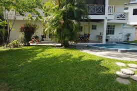 Bon Accord Village Apartment | Palm Breeze Villa can sleep 1-5 persons.