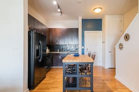 First Ward Apartment | Uptown condo with private skyline terrace views
