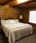 Orange City Cabin | Unique "Log Cabin on a Lake" in the Woods