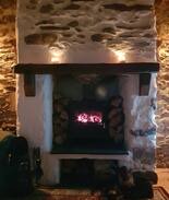 Newborough Cabin | Tan Y Fron Cottage Newborough beach with cosy fire