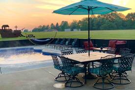 Fayetteville House | The Aviator's Lounge, loft living in the NRG