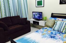 Santa Rosa Apartment | Cozy modern condo next door to Enchanted Kingdom