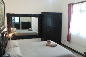 Mendoyo Apartment | Medewi Manor: Surfers Heaven: Pool View Apartment.