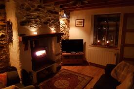 Newborough Cabin | Tan Y Fron Cottage Newborough beach with cosy fire