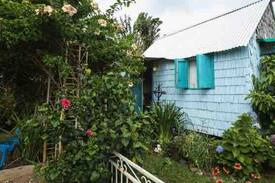 Calibishie House | Grace’s Romantic Cottage at Jacoway Inn
