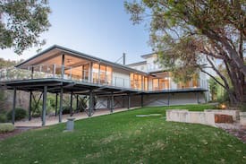 Eagle Bay House | Deck House - Stunning treetop and ocean glimpses