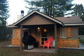 Mio Cabin | RIVER BEND LODGE: Directly on the Au Sable River- Bring your canoe here!