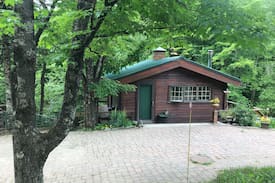Enosburg Falls Cabin | Cottage Literally Over a Waterfall