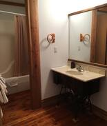 Chetek Bed & Breakfast | Inn Greener Pastures - Log Cabin Room