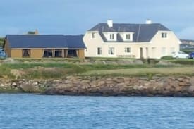 Dingle House | Emlagh cottage overlooking Dingle harbour and bay