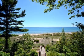 New Era House | Whiskey Creek Cottage is just steps down to the private beach frontage!