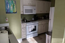 Summerville Apartment | Masters Week Condo George Walton Condominiums