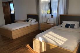 San Juan House | Kai’ea Beach House room with private entrance